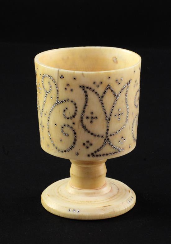 A rare English ivory and pique work cup, c.1700, height 7.5cm (3in.)
